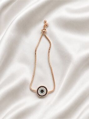 Rose Gold Evil Eye Slider Bracelet with Blue and Black Accents